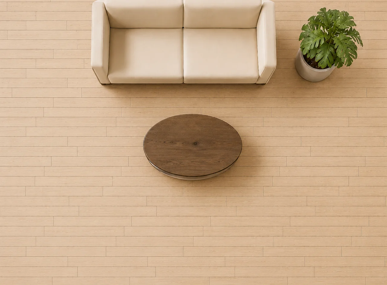 Top view of a living room floor in narrow, short boards — many board lines create a busier surface
